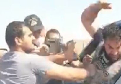 Kamil Zeynallı polisin gözü qarşısında yumruq davasına çıxdı - VİDEO