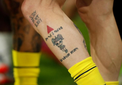 Çinli futbolçulara tatuaj qadağan edildi