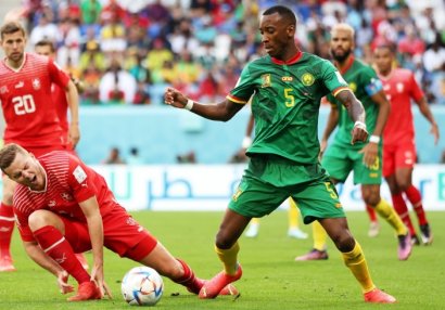 Kamerunun futbolçusu DÇ-də Rusiya bayrağı ilə oynadı - FOTO