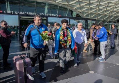 DÇ-də iştirak edən Azərbaycan atletləri Bakıya qayıtdılar